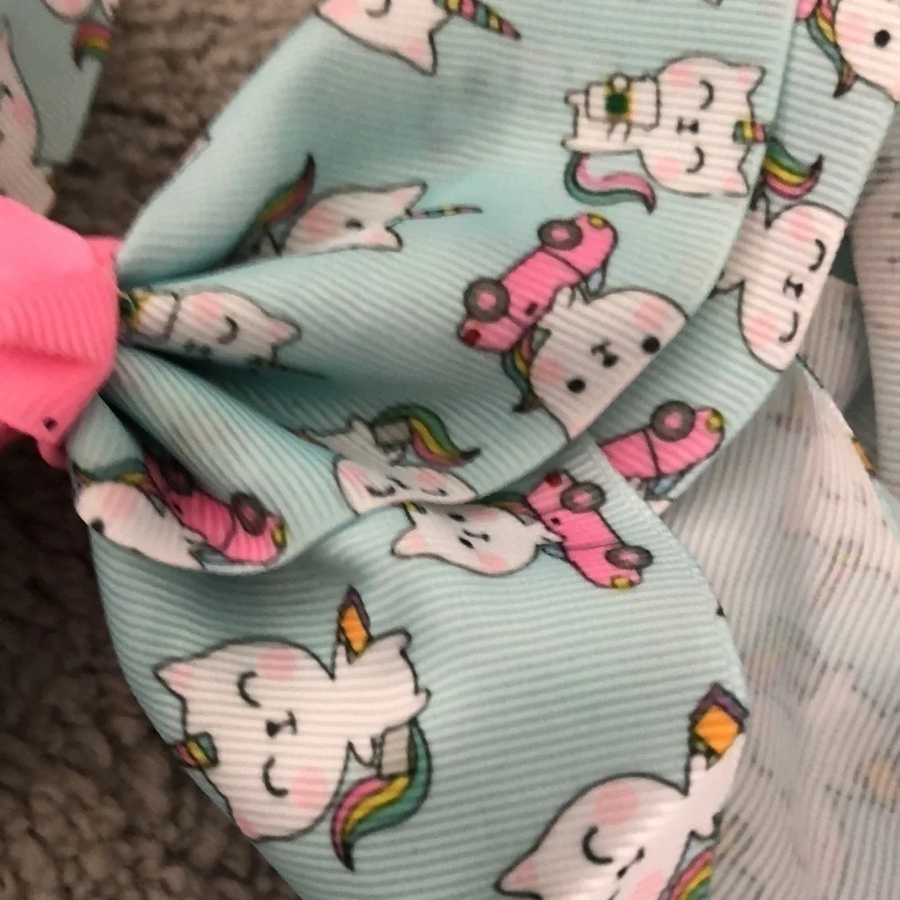 Teal and pink unikitty printed hair clip ribbon.